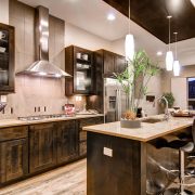 A kitchen room filled with all furniture